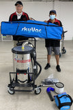 SkyVac Customer purchasing an Interceptor and holding their pole bag